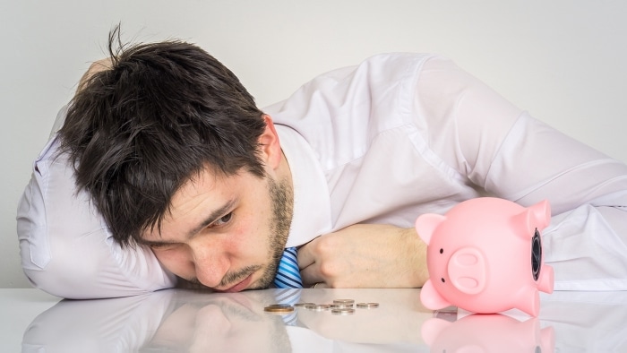 guy with a piggy bank