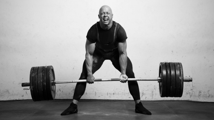 man lifting weight