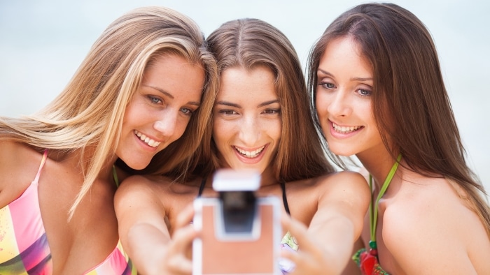 women taking selfie